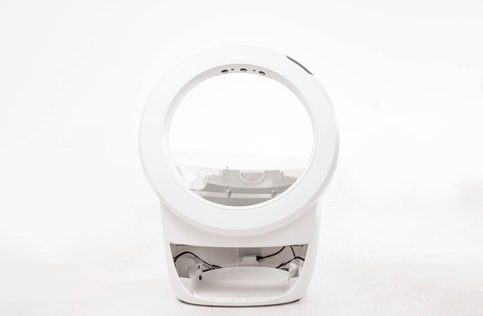 Placing base and bezel right side up on the floor