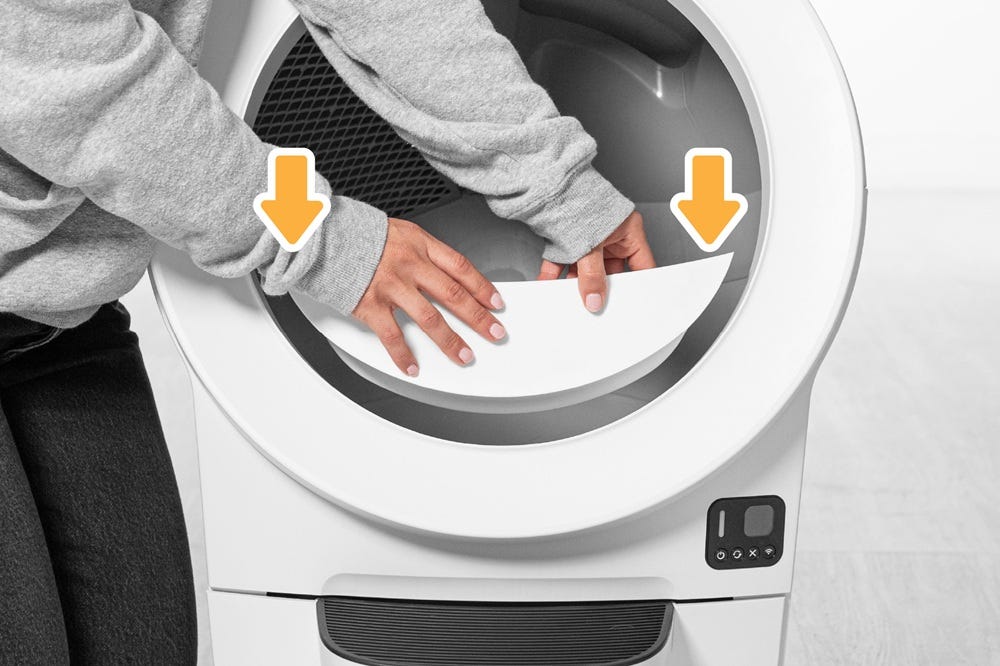 Holding fence above Litter-Robot EVO bezel