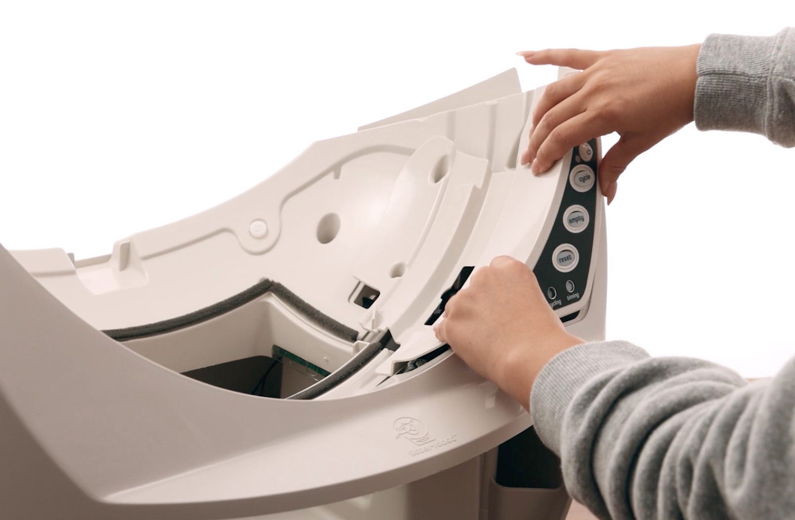 Reassembling control panel cover over keypad and board