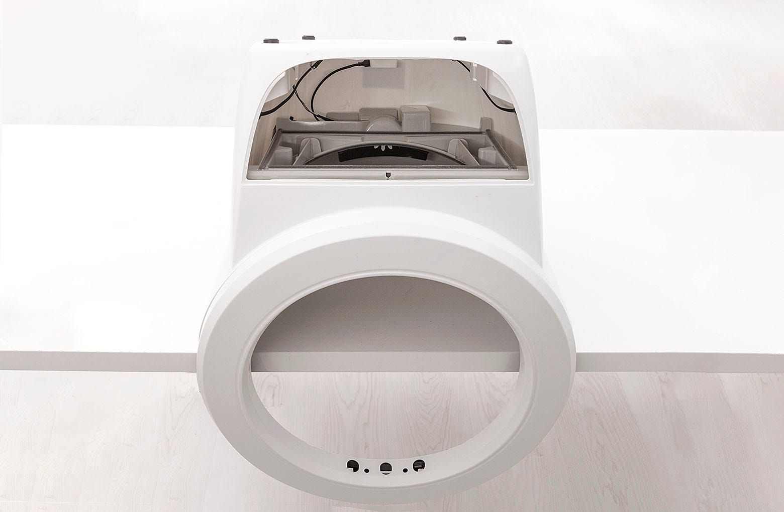 Positioning the base upside down on a table or box