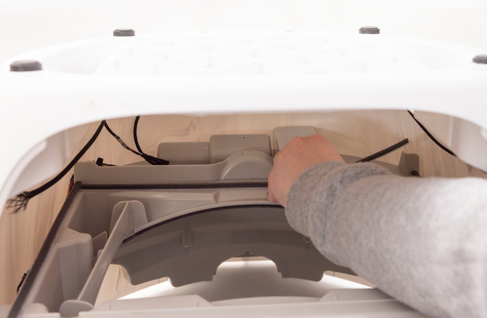 Placing the forward and rear lower waste port strips