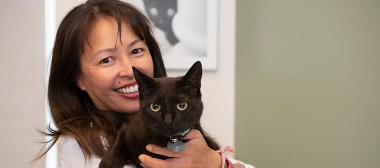 Dr. Justine Lee with black cat