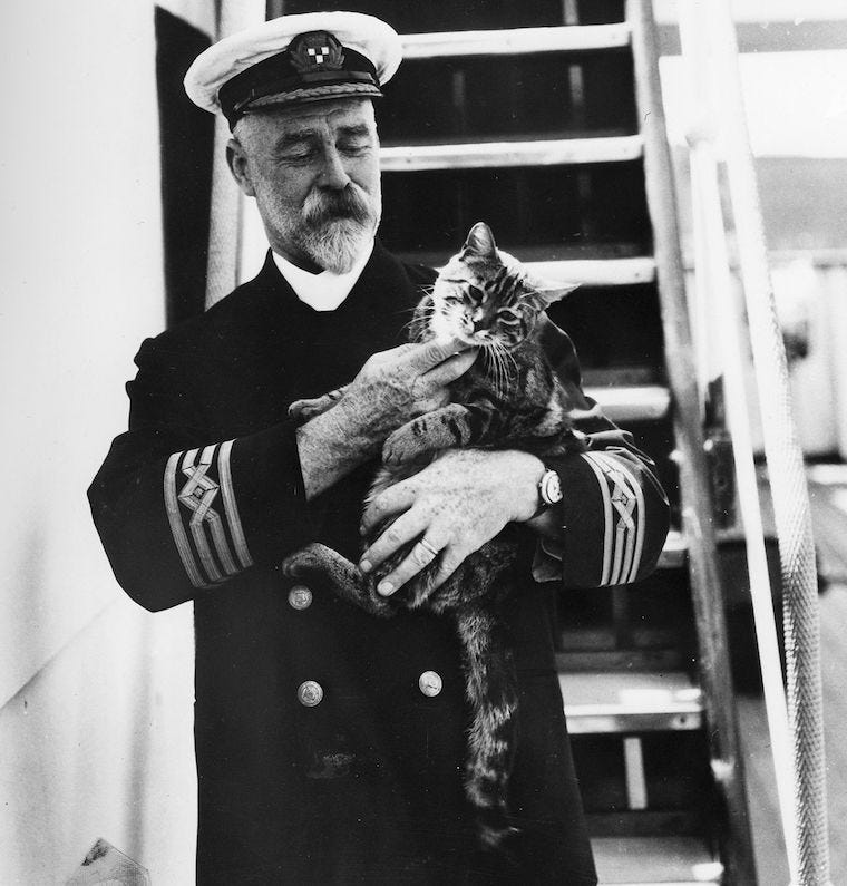 Sea captain AJ Hailey with tabby ship's cat