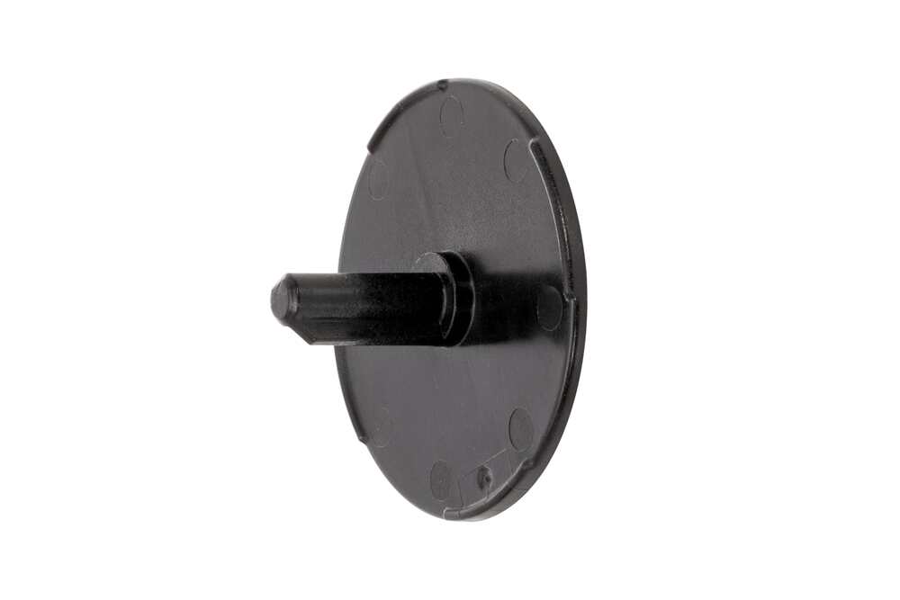 Removing the black, circular dispenser adapter and set it aside to be used with the new motor assembly