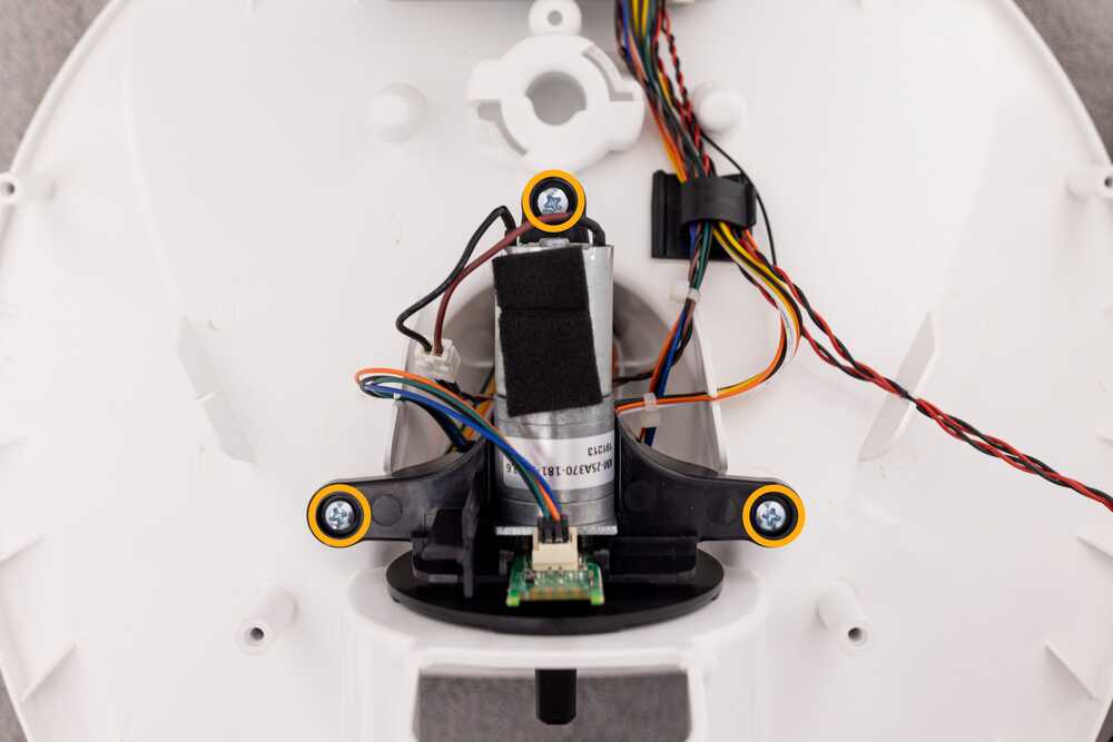Removing three screws from the motor bracket