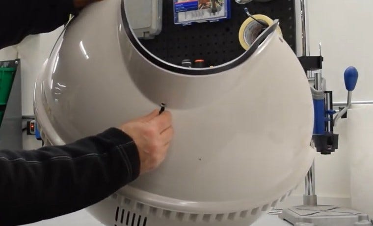 Securing the liner with screw and nut