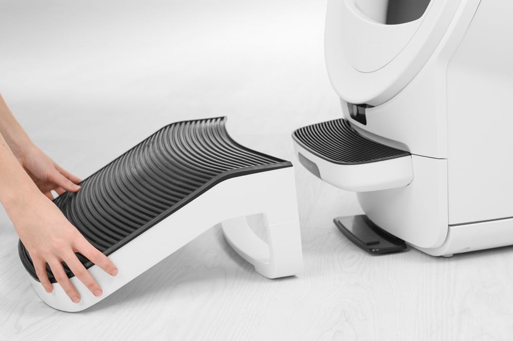 Closeup of ramp with two hands on the front