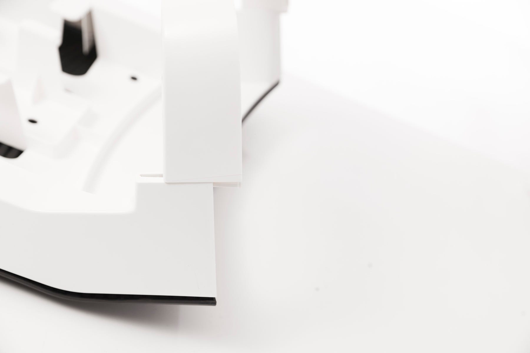 Flip ramp over and slide the ramp adaptor into slots until it clicks