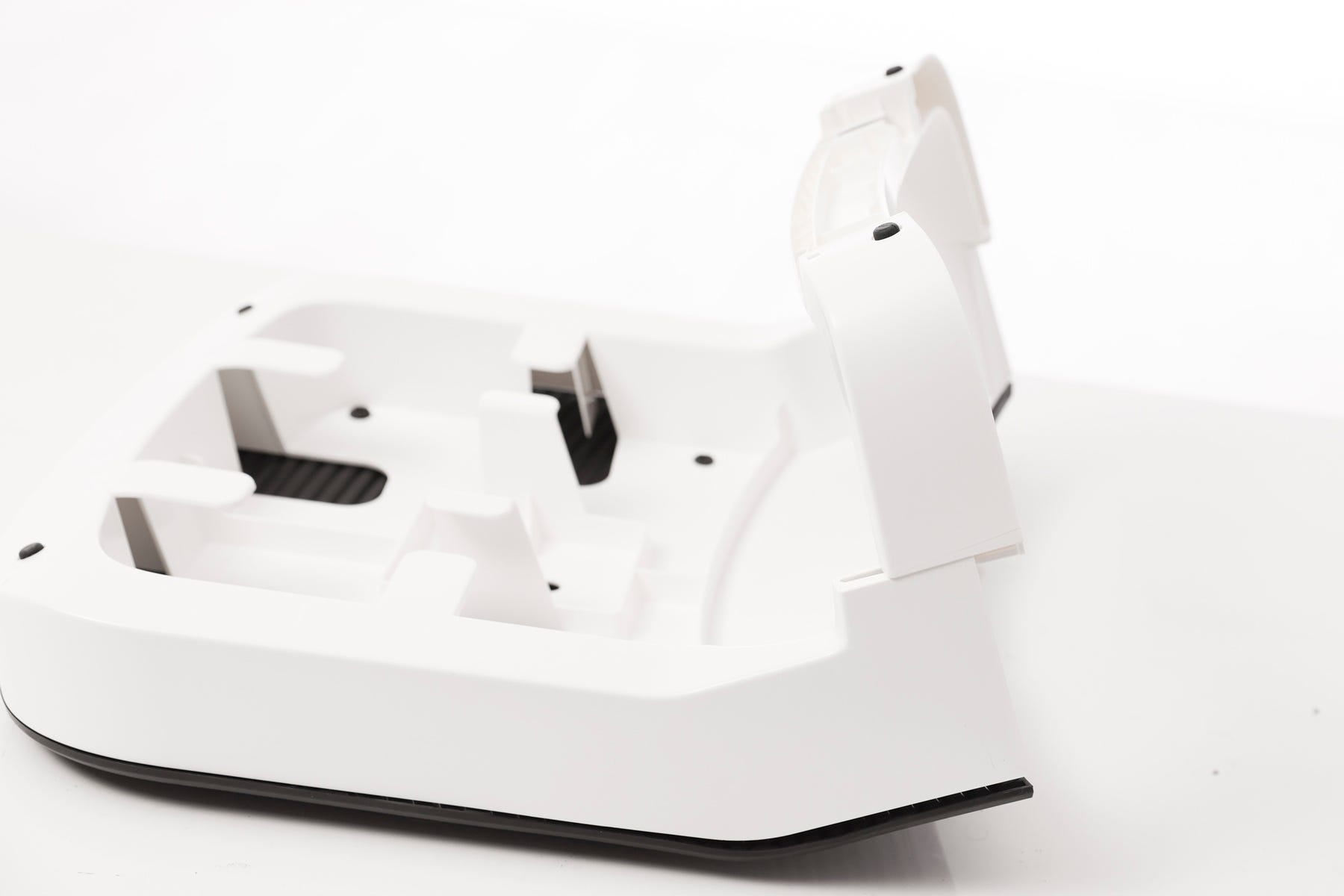 Flip ramp over and slide the ramp adaptor into slots until it clicks