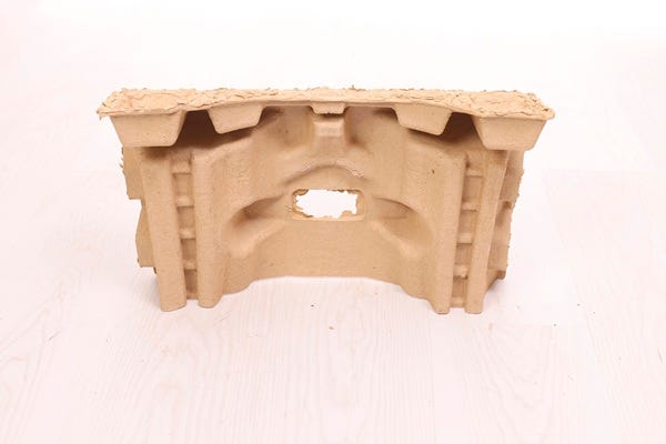 Closeup of bottom back molded pulp insert