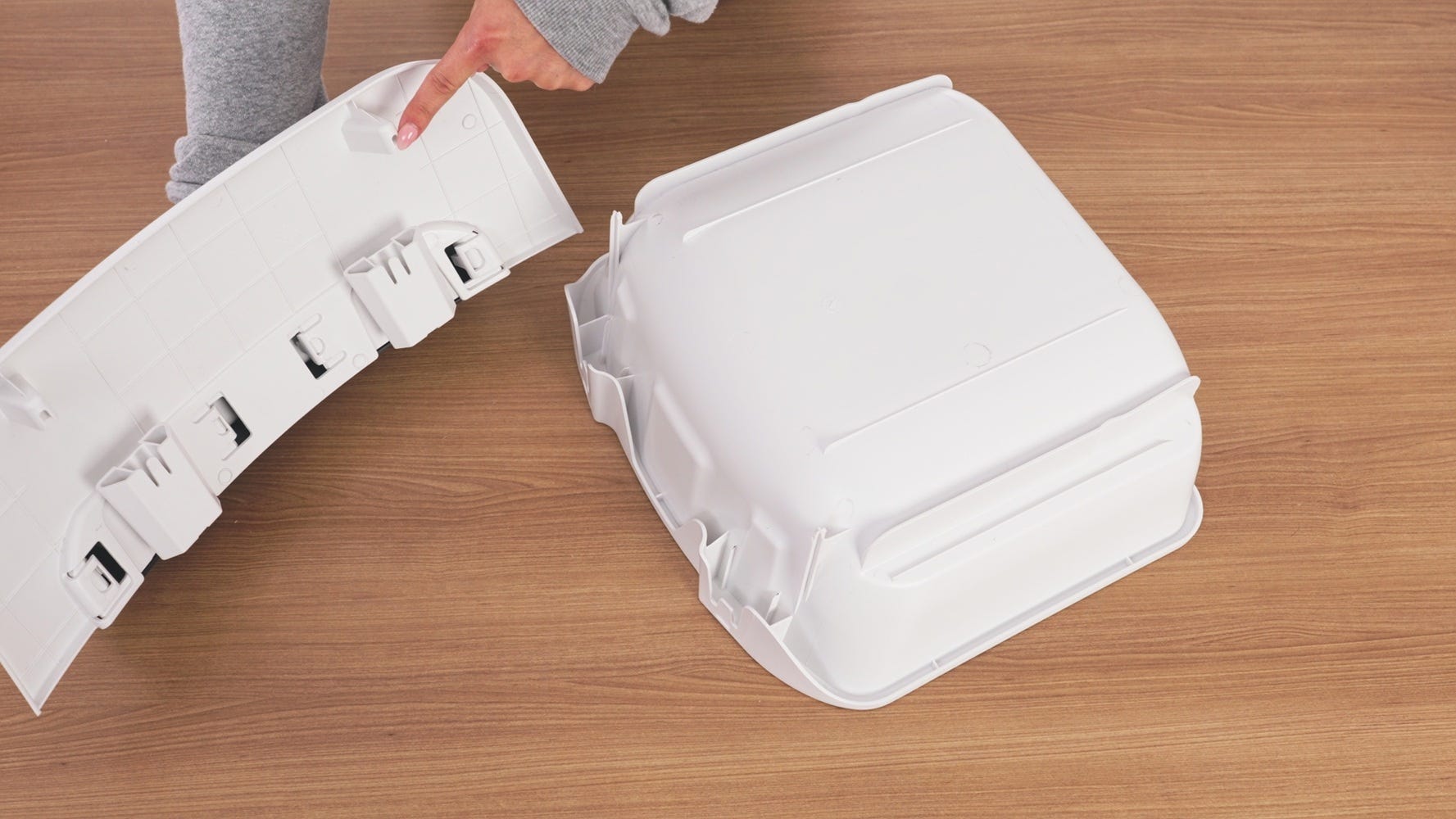 Pointing to the drawer alignment slots on the drawer front