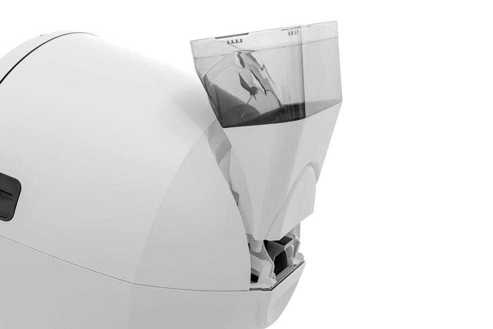 LitterHopper posts aligning with circular pockets at back of unit