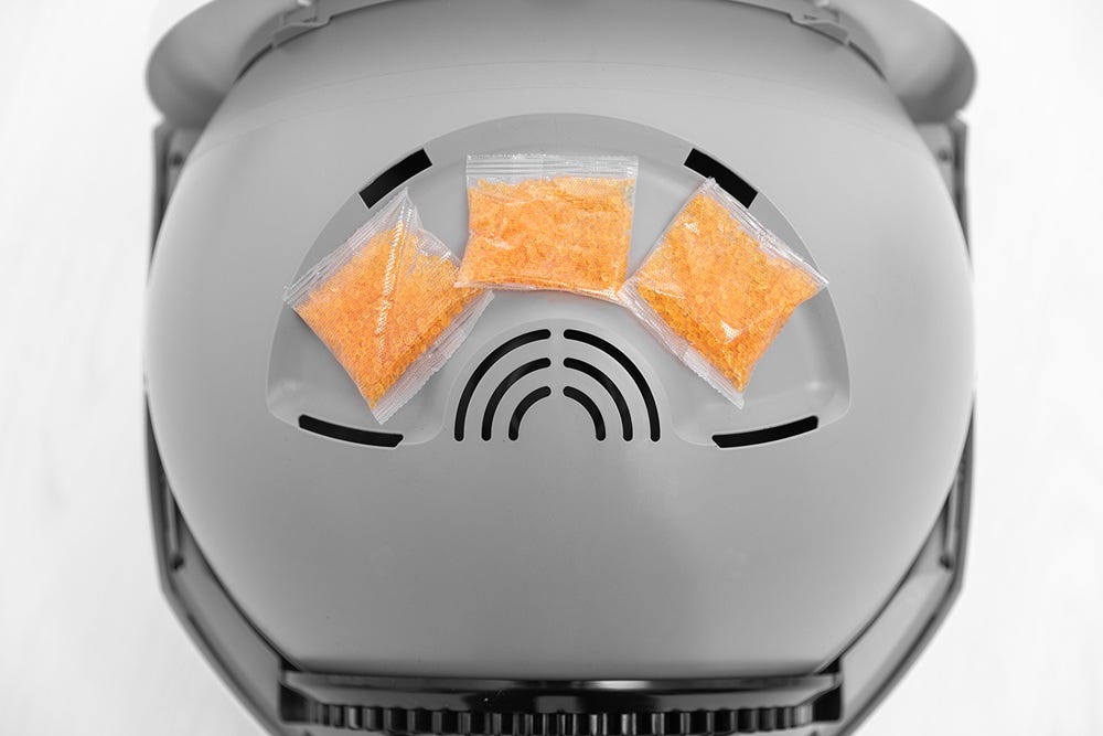 OdorTrap packs placed in carbon filter area with filter cover removed