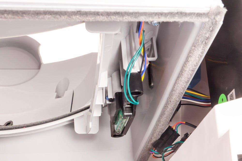 Close-up of drawer full indicator sensor bracket