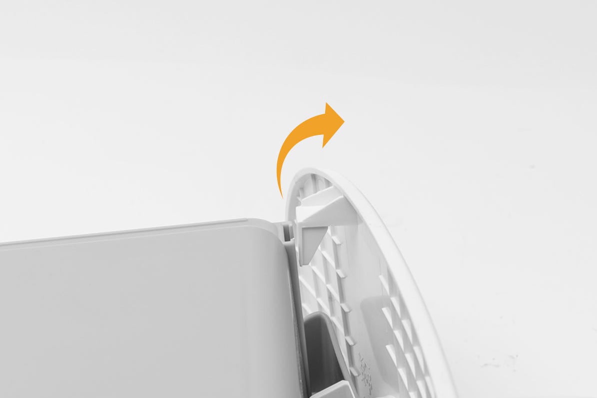 Close up of drawer tab with arrow pointing away from drawer body