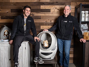 Smiling Brad and Jacob with Litter-Robot