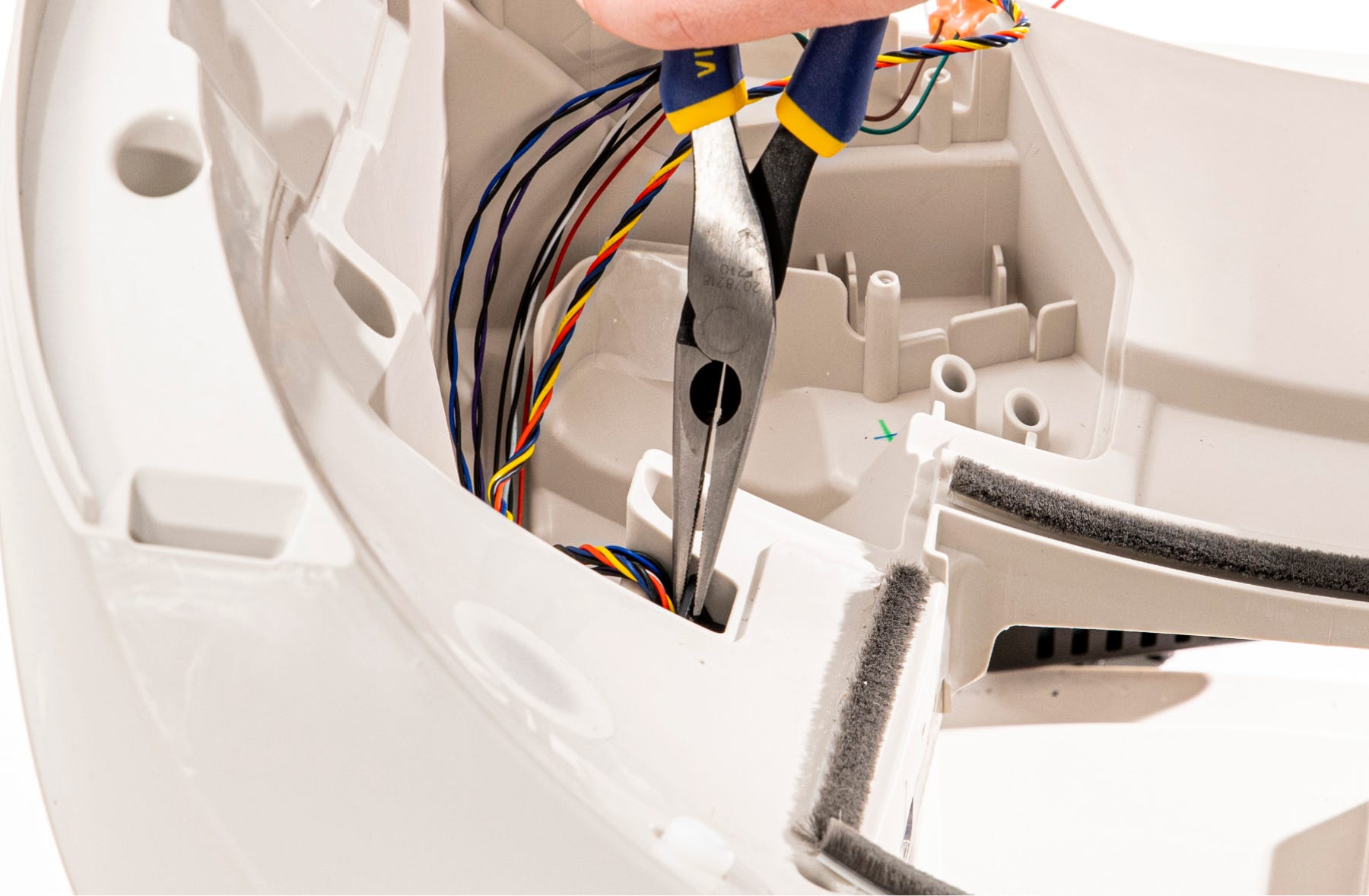 Removing the wire stopper and feeding DFI wires through hole