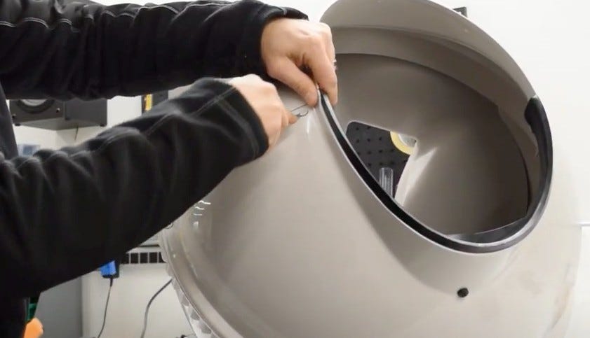 Removing screw covers from the globe