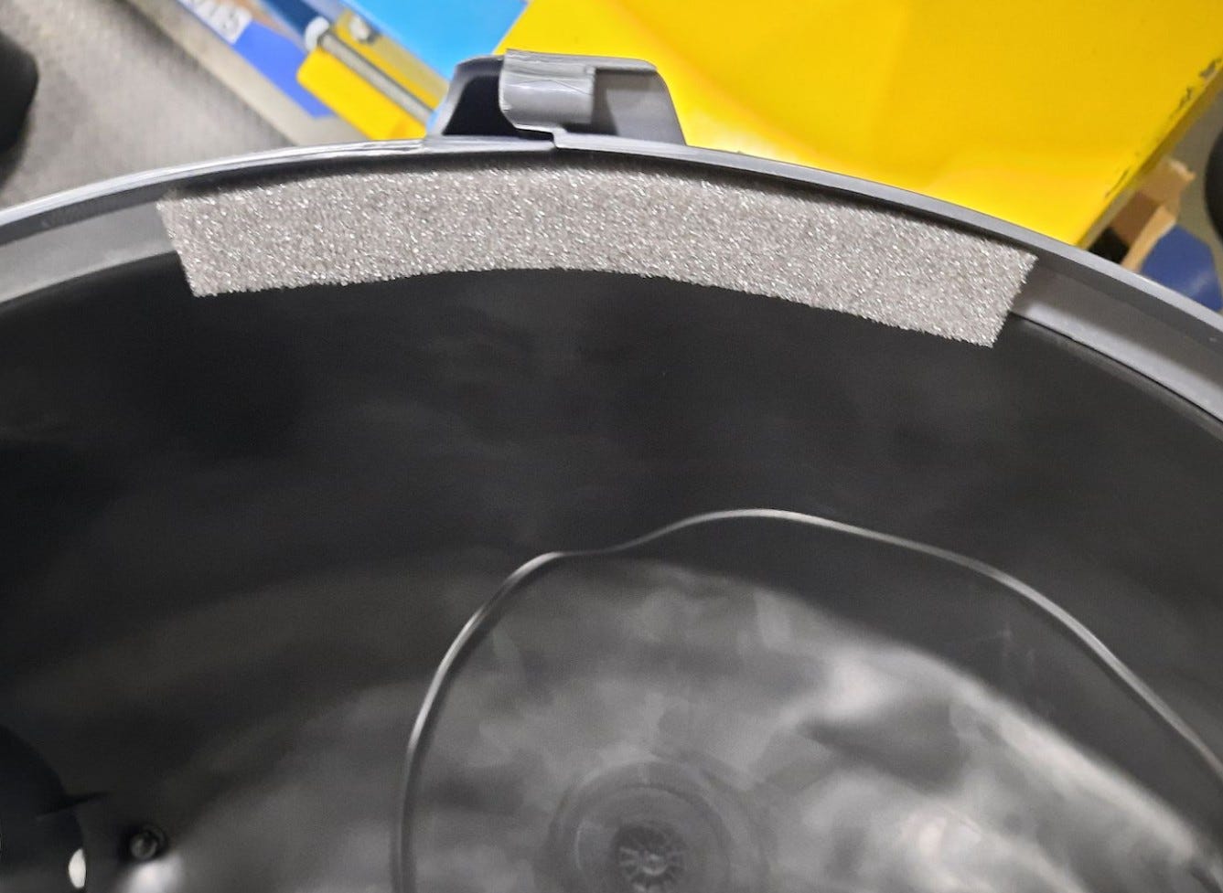 Attaching the new foam strip