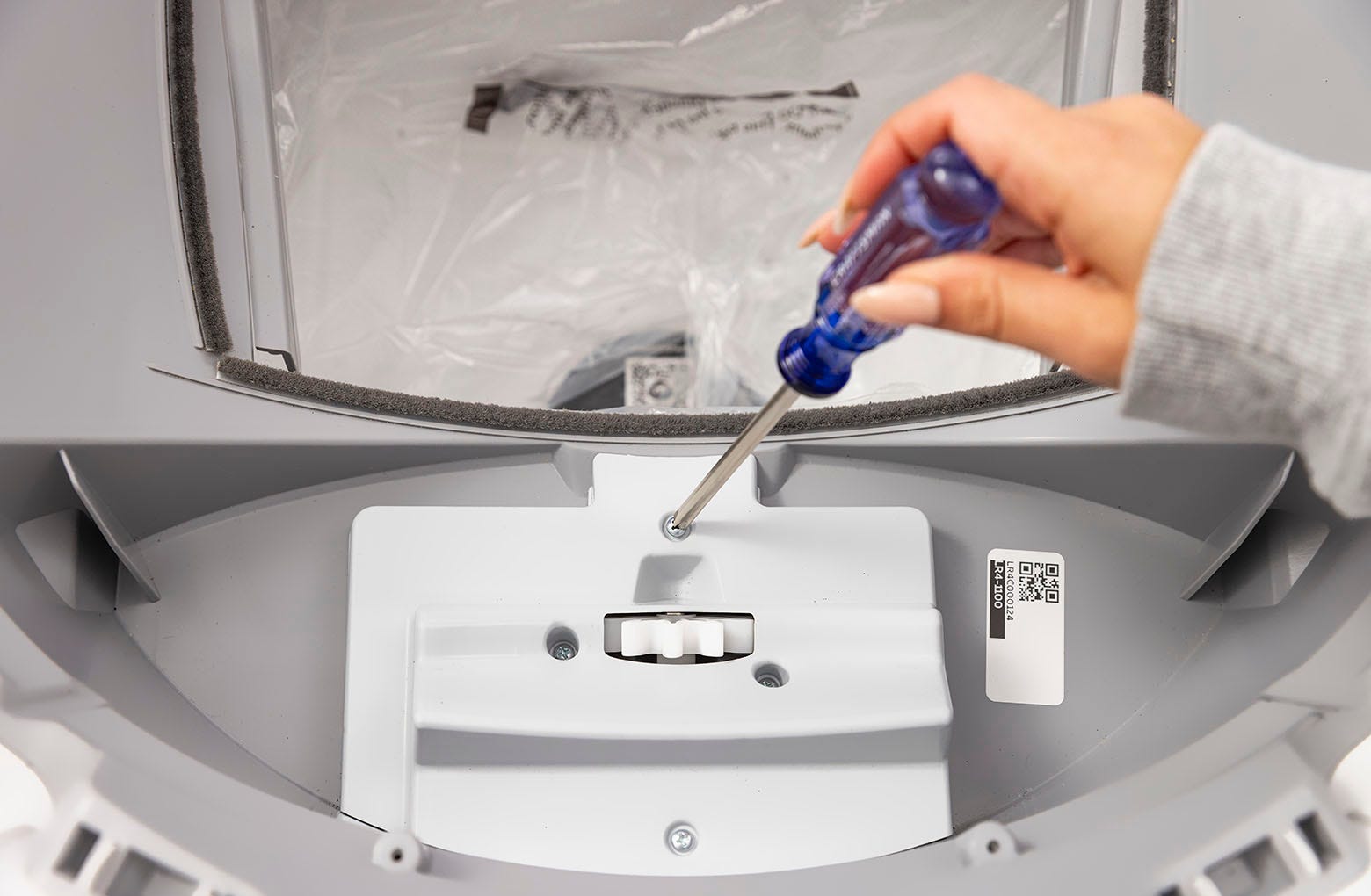 Removing screws from the motor cover