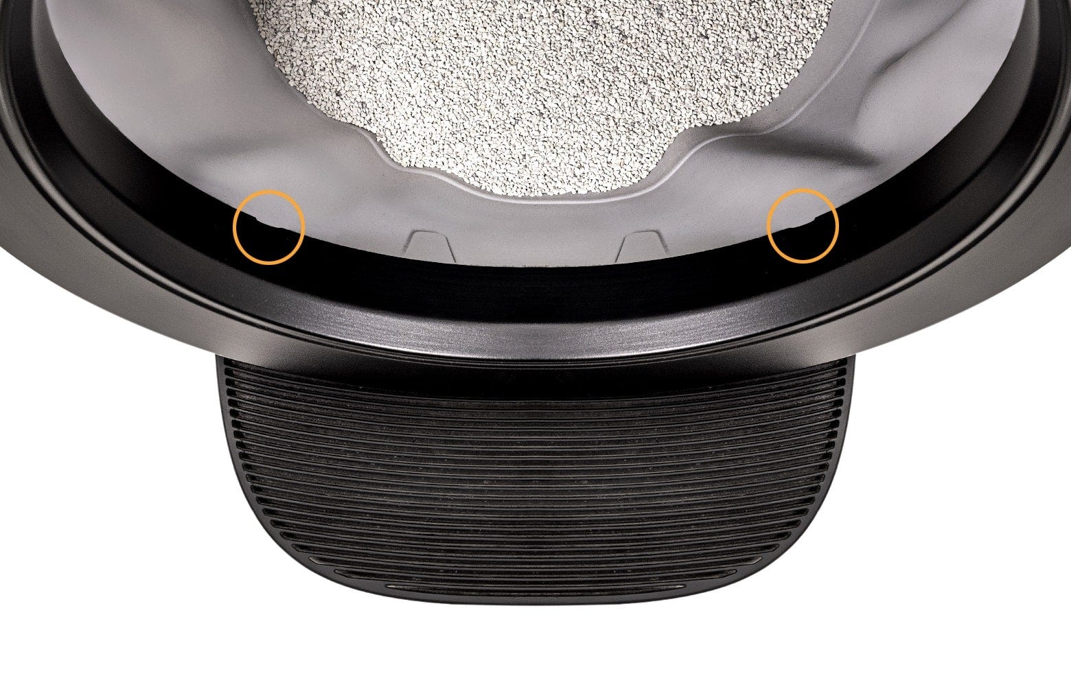 two “notches” on the lower inside edge of the bezel