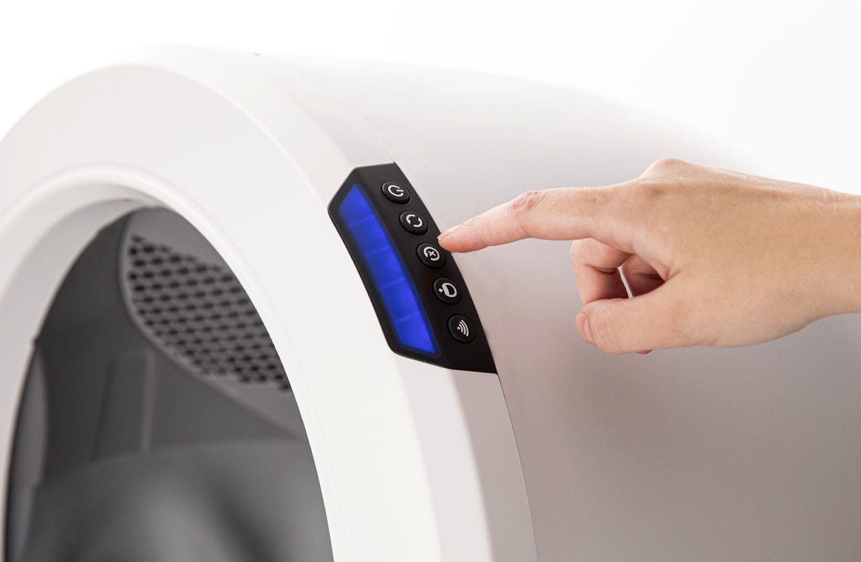 Litter-Robot 4 - Pressing the Reset button to zero the weight sensors.